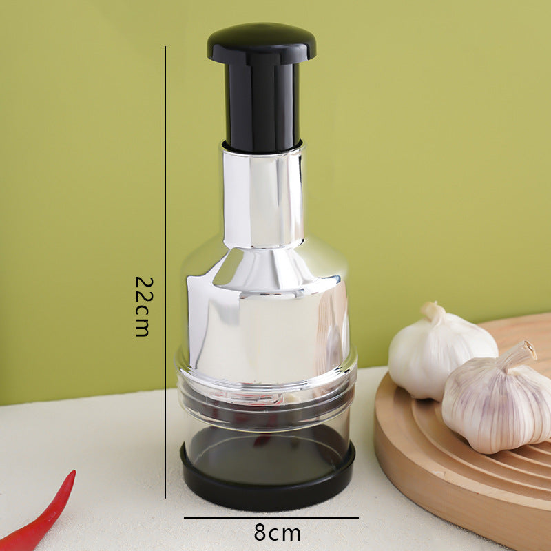 Garlic press with dimensions on a green background