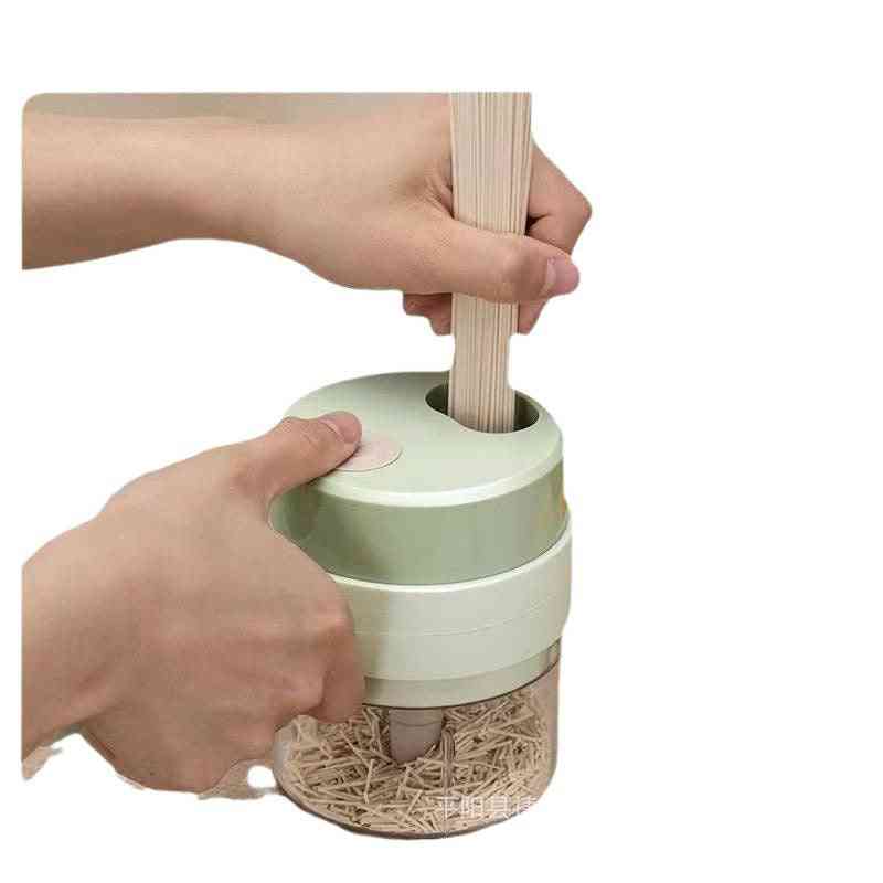 Person using a straw cleaning tool with a white background