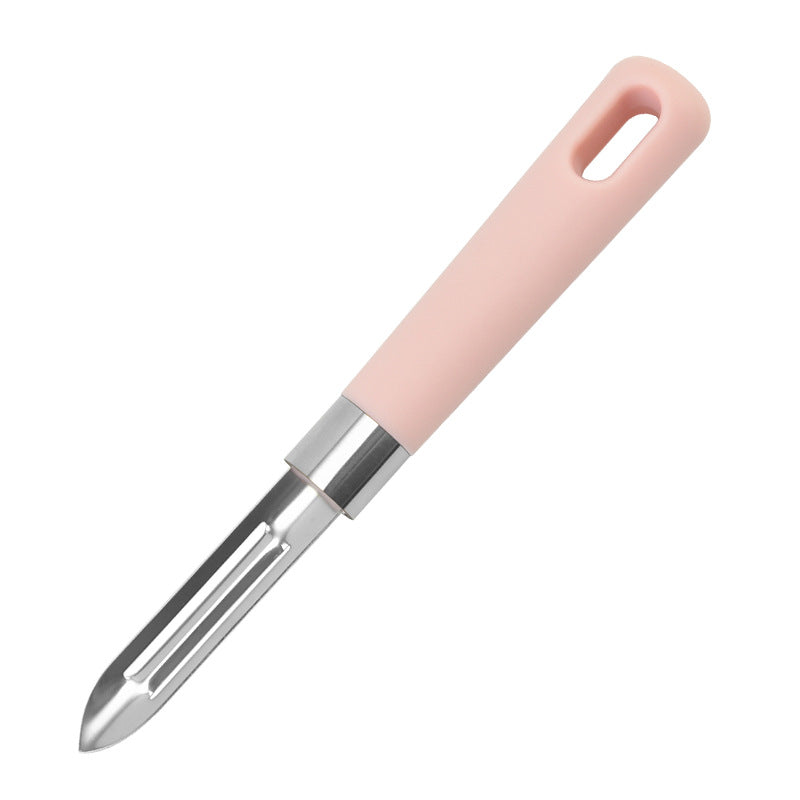Pink peeler with metal blade on a white background