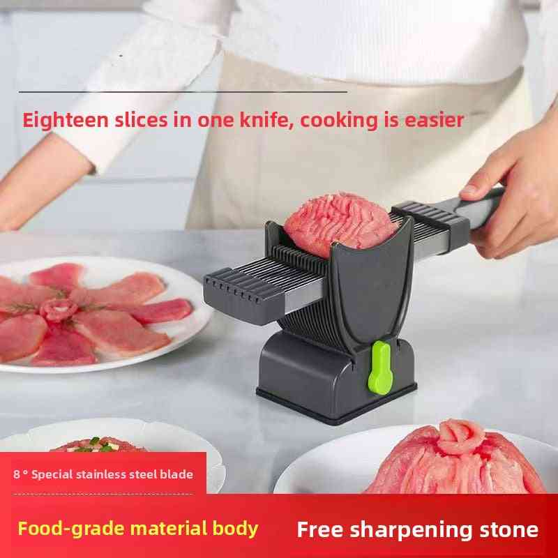 Kitchen utensils including a grater, brush, and holder on a white surface with packaging.