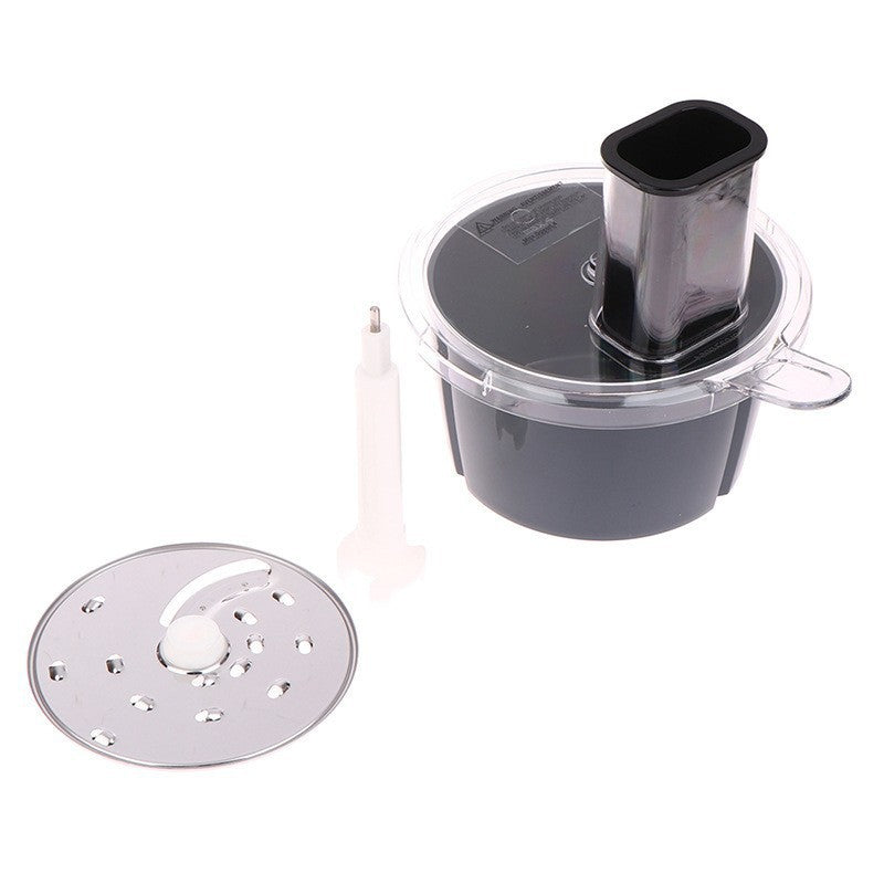 Gray food processor container with black top and metal blade on a white background