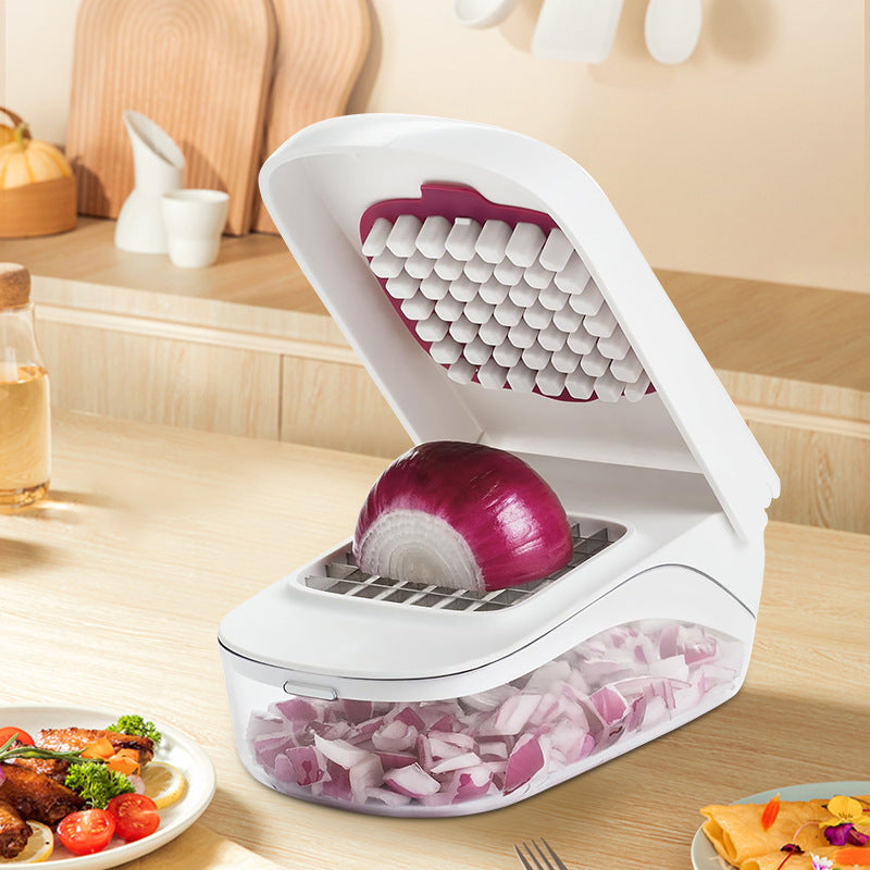 Kitchen chopper with chopped onions on a wooden countertop