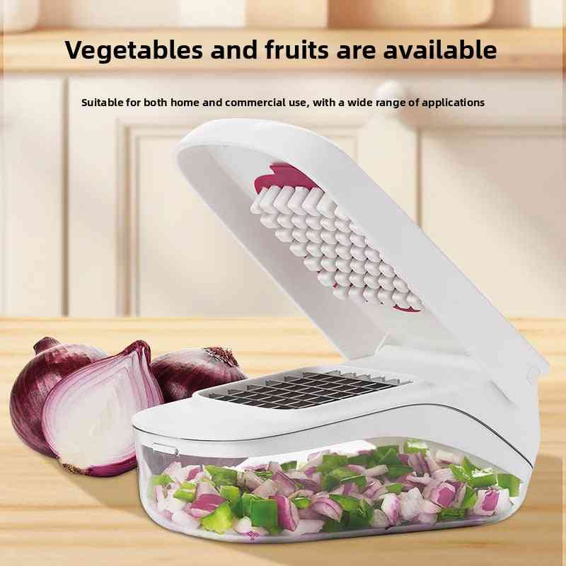 Vegetable chopper with chopped vegetables on a wooden surface